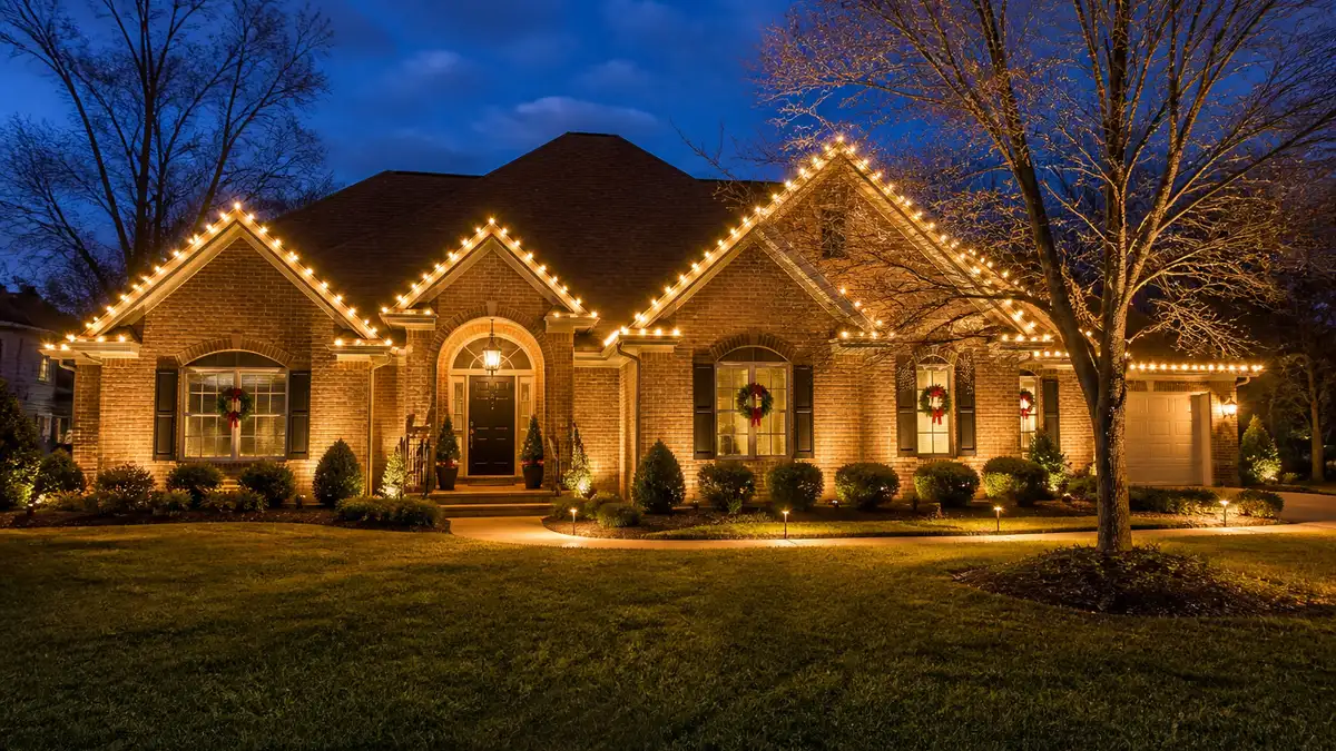 Alabama home decorated with professional Christmas lights along the roofline